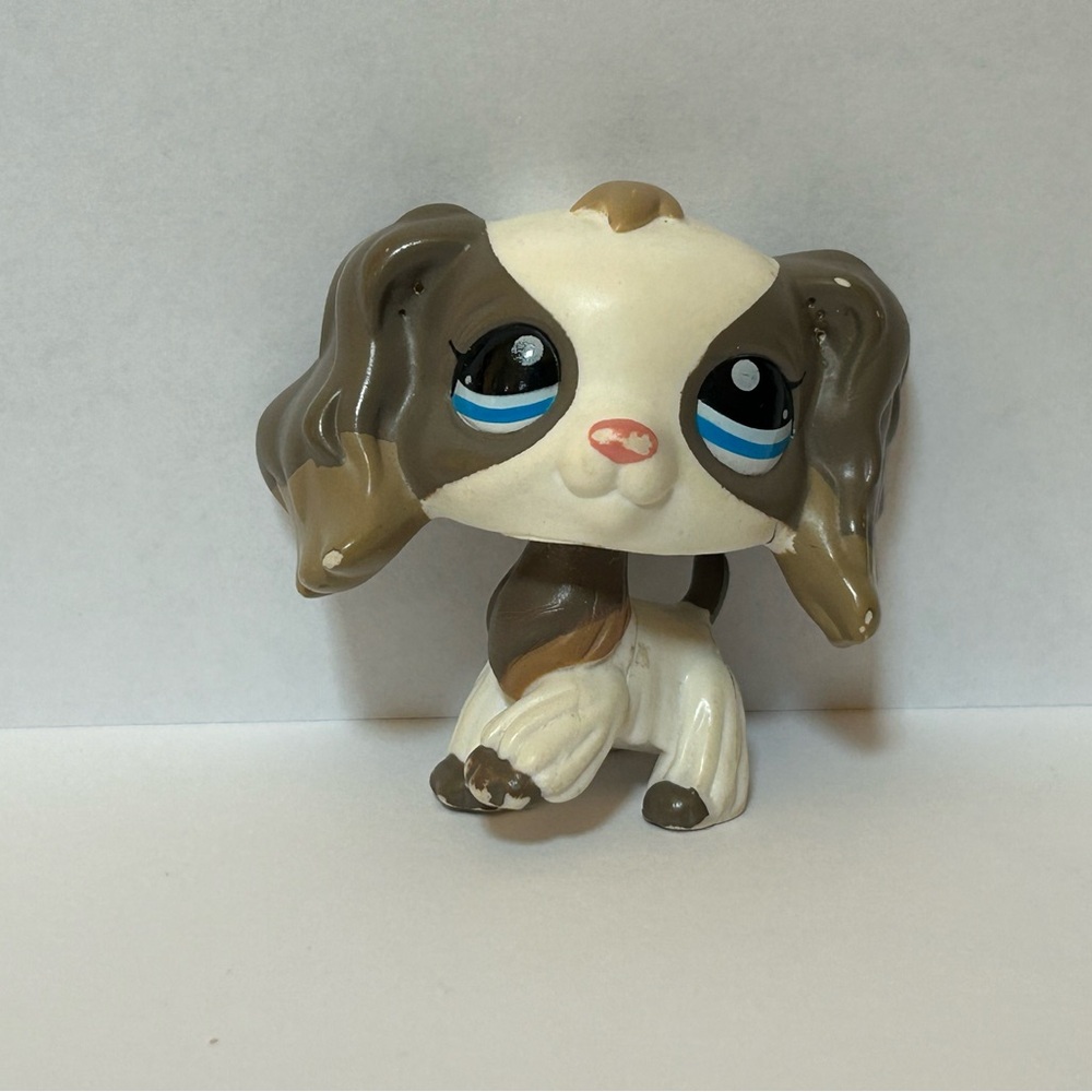 Adorable Brown and White Small Pet Figurine